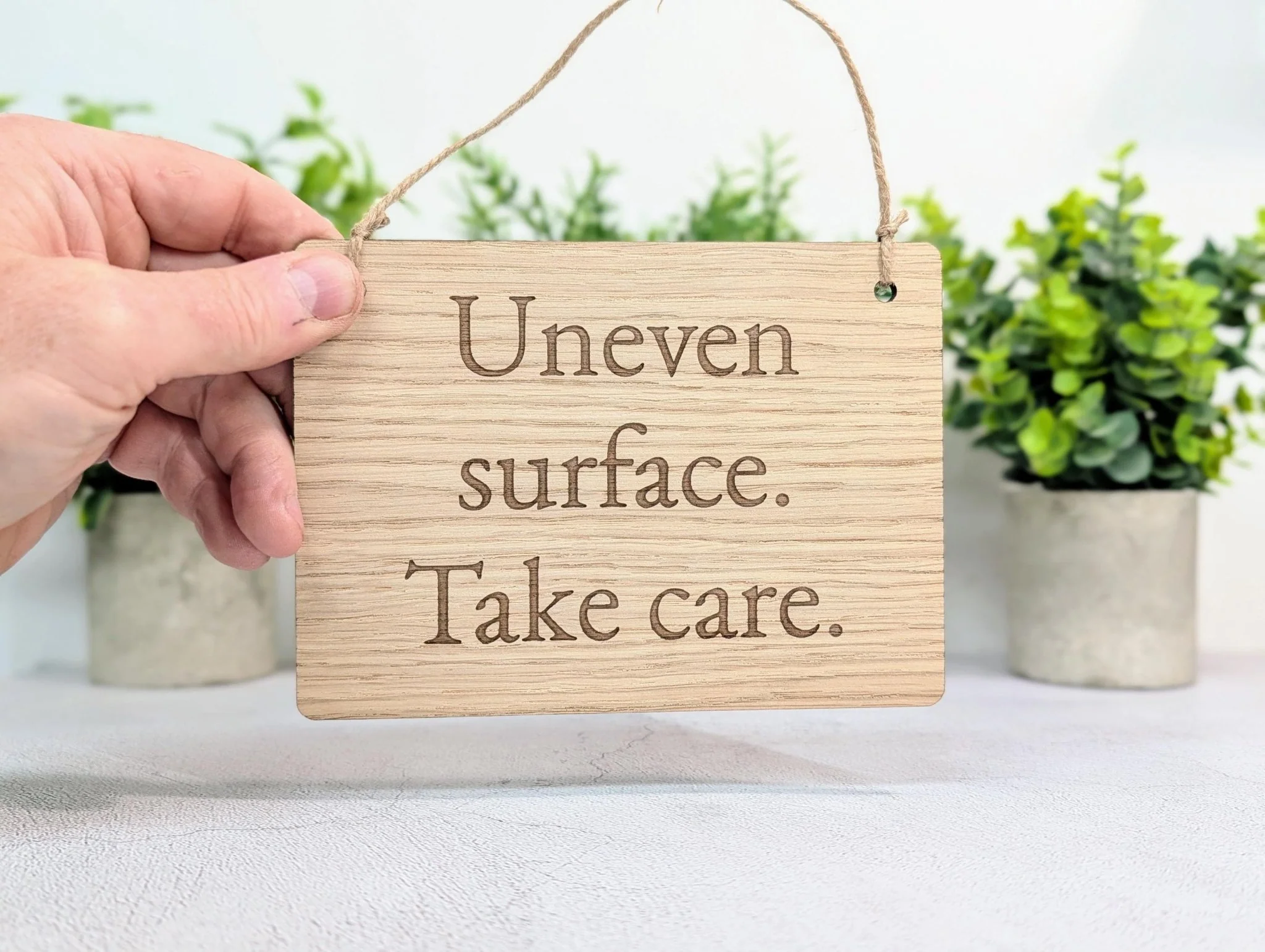 Uneven Surface Take Care Sign – Oak Veneered Wooden Hanging Sign, Personalised Text Option, Handmade in Wales, Eco Packaging - 4 Sizes - Image 2