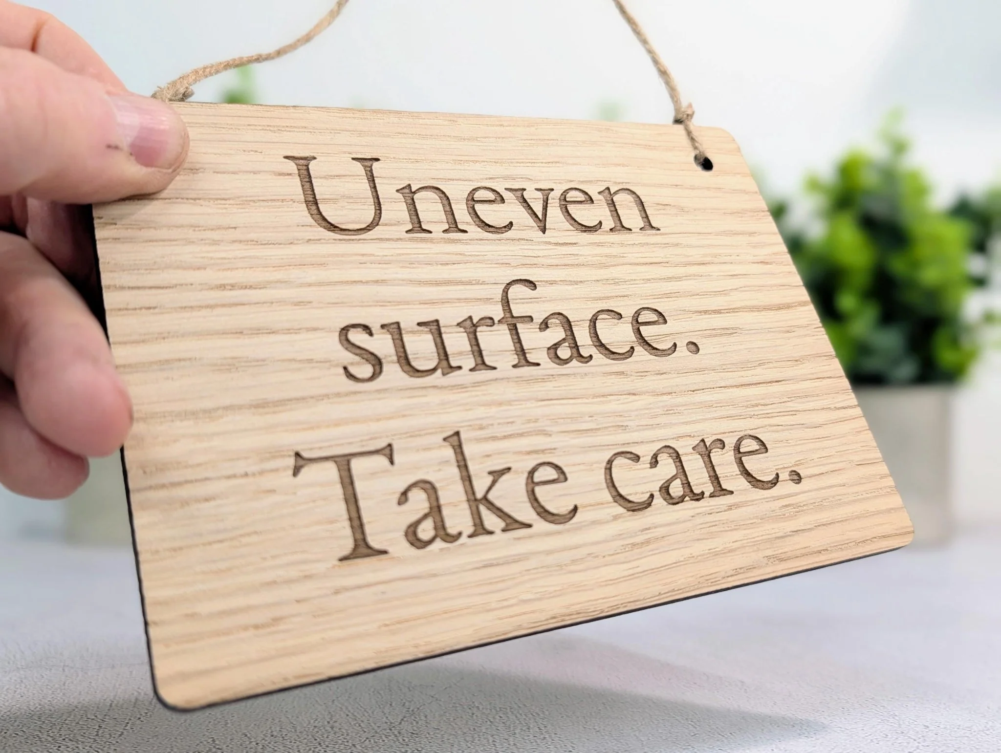 Uneven Surface Take Care Sign – Oak Veneered Wooden Hanging Sign, Personalised Text Option, Handmade in Wales, Eco Packaging - 4 Sizes - Image 3