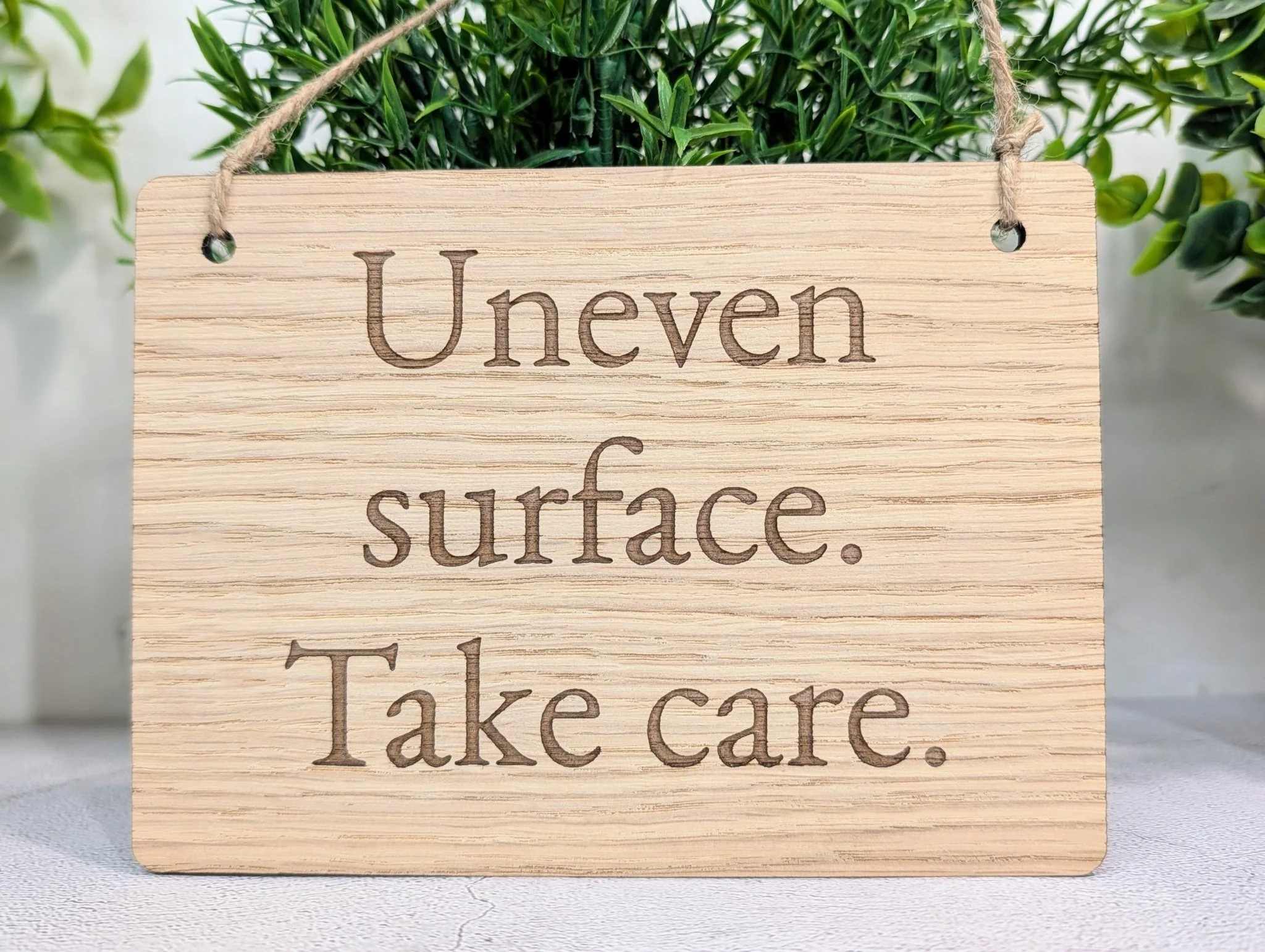 Uneven Surface Take Care Sign – Oak Veneered Wooden Hanging Sign, Personalised Text Option, Handmade in Wales, Eco Packaging - 4 Sizes - Image 4