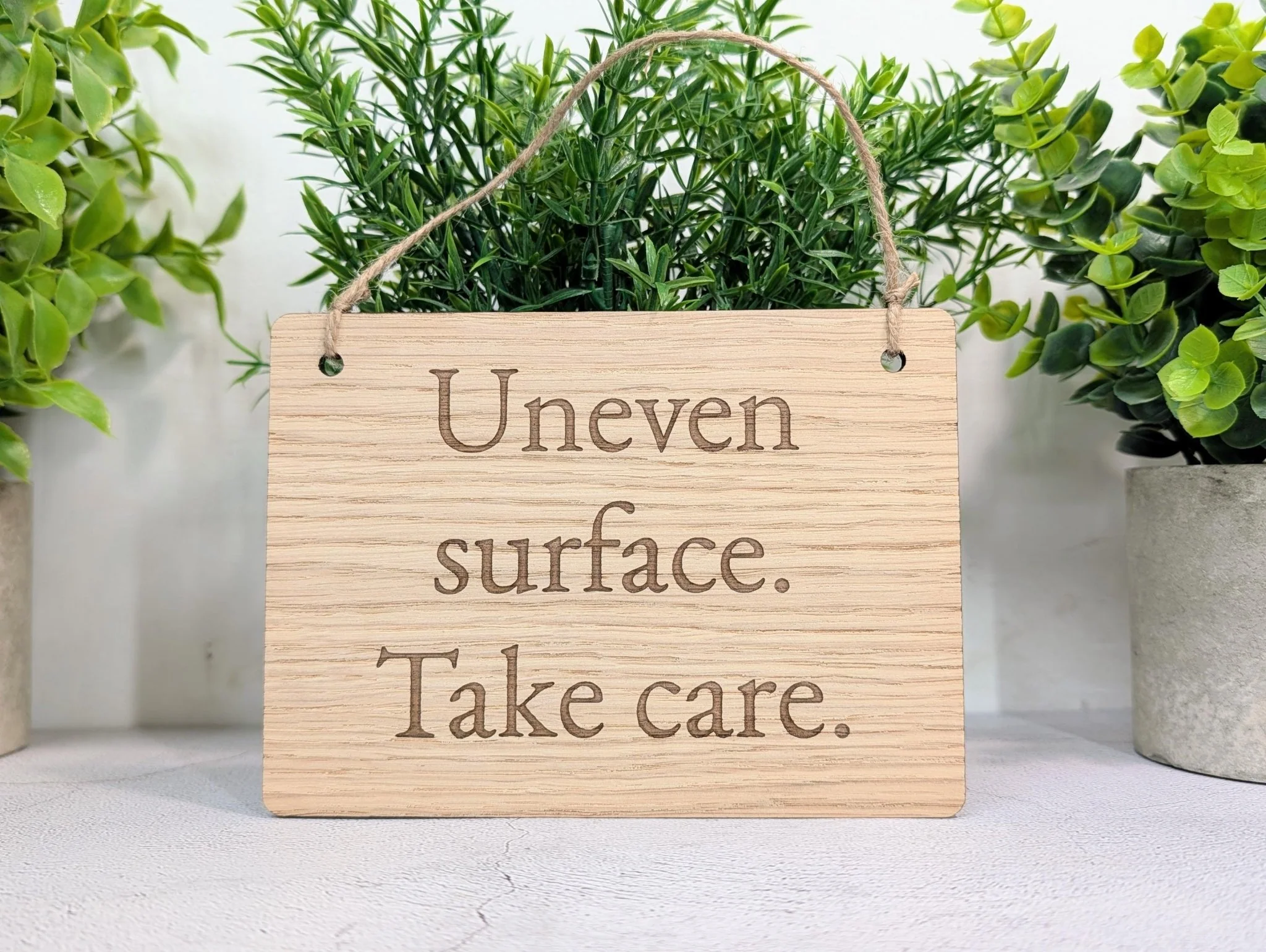 Uneven Surface Take Care Sign – Oak Veneered Wooden Hanging Sign, Personalised Text Option, Handmade in Wales, Eco Packaging - 4 Sizes - Image 5
