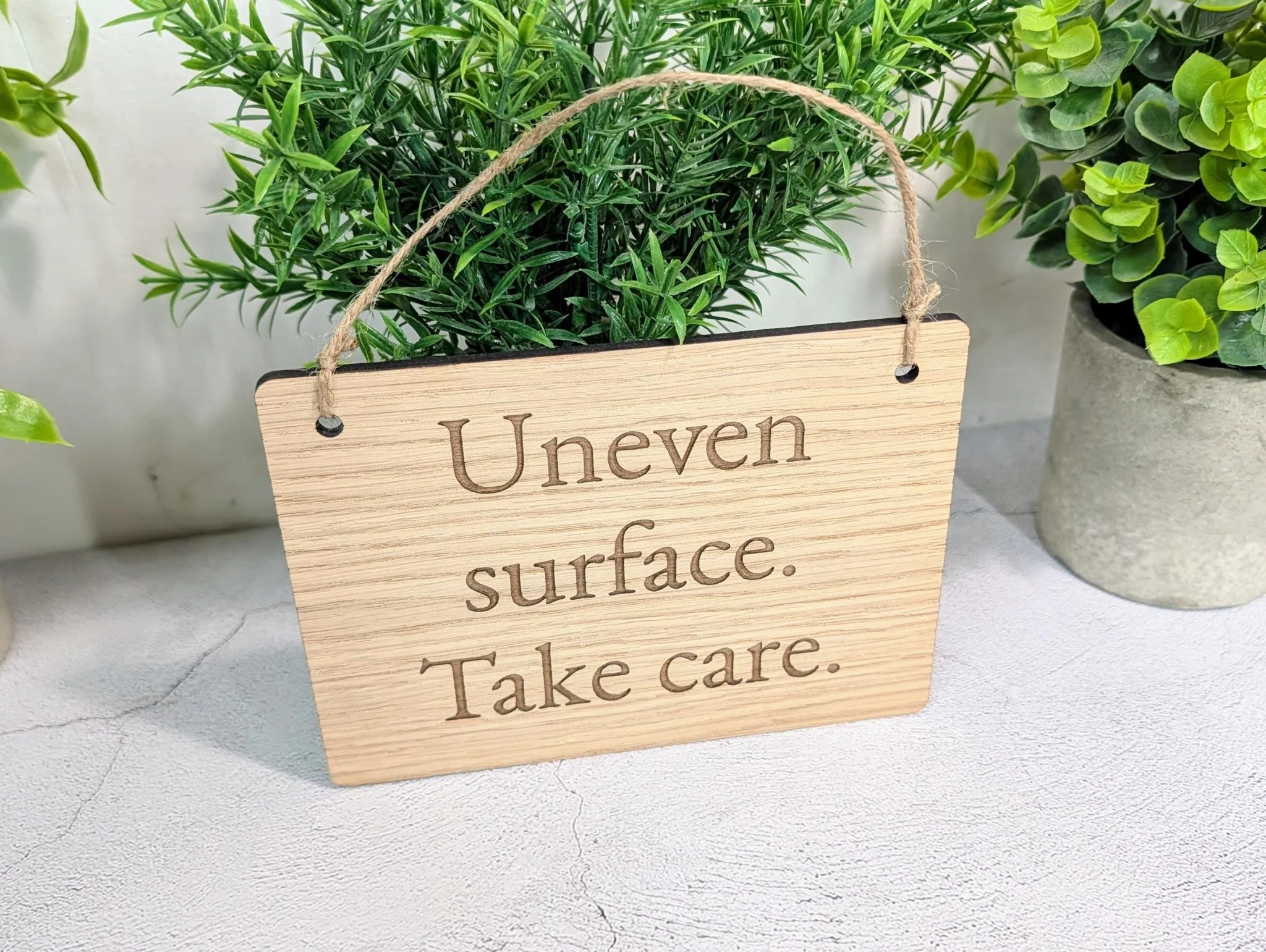 Uneven Surface Take Care Sign – Oak Veneered Wooden Hanging Sign, Personalised Text Option, Handmade in Wales, Eco Packaging - 4 Sizes - Image 6