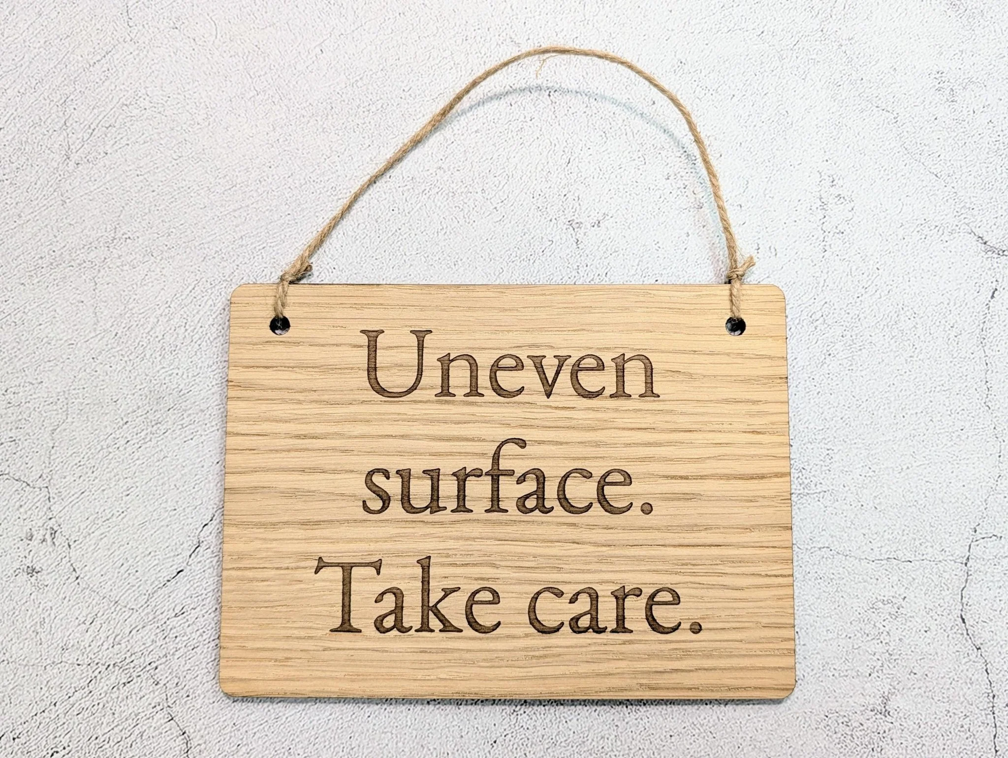 Uneven Surface Take Care Sign – Oak Veneered Wooden Hanging Sign, Personalised Text Option, Handmade in Wales, Eco Packaging - 4 Sizes - Image 7