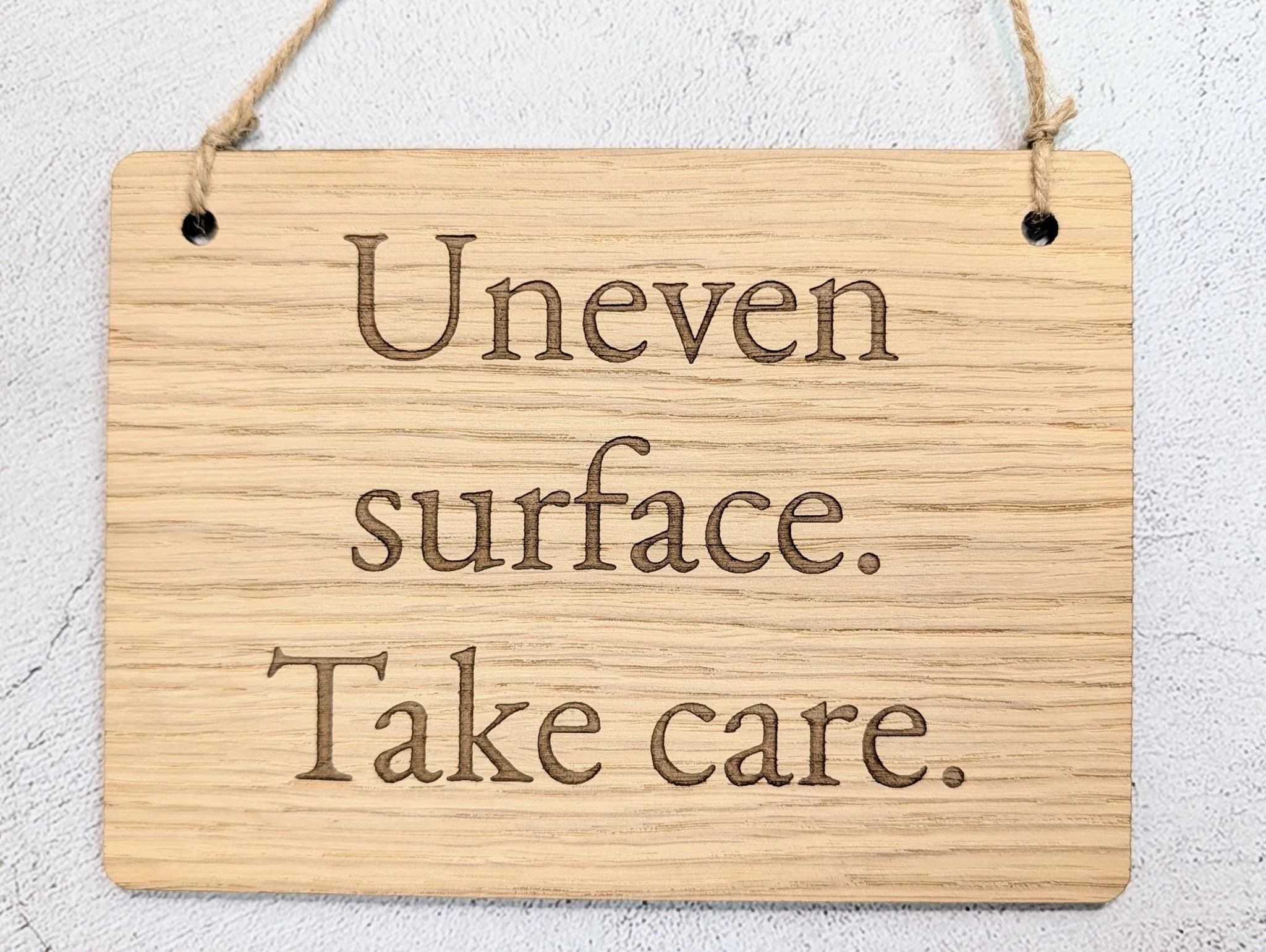 Uneven Surface Take Care Sign – Oak Veneered Wooden Hanging Sign, Personalised Text Option, Handmade in Wales, Eco Packaging - 4 Sizes - Image 8