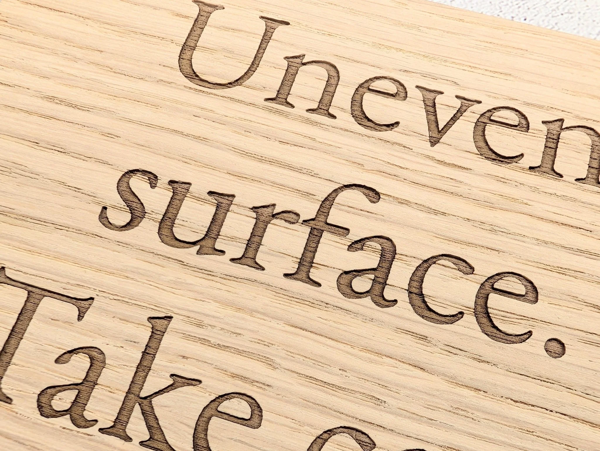Uneven Surface Take Care Sign – Oak Veneered Wooden Hanging Sign, Personalised Text Option, Handmade in Wales, Eco Packaging - 4 Sizes - Image 9